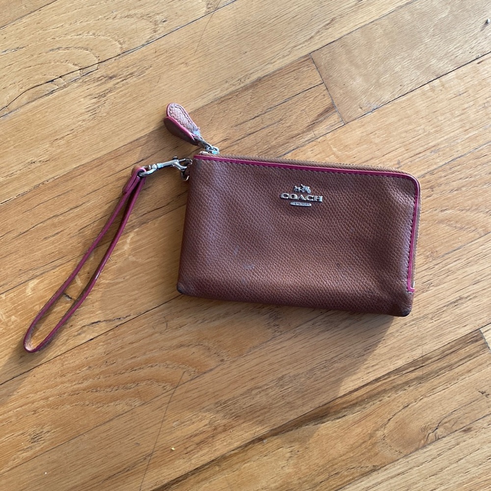 Coach leather wristlet with pink interior